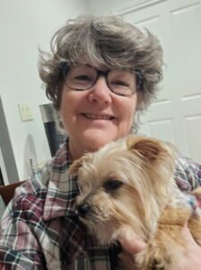 woman with a dog in her lap