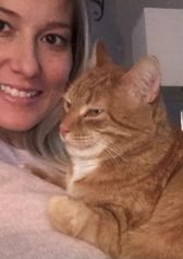 picture of woman with orange cat